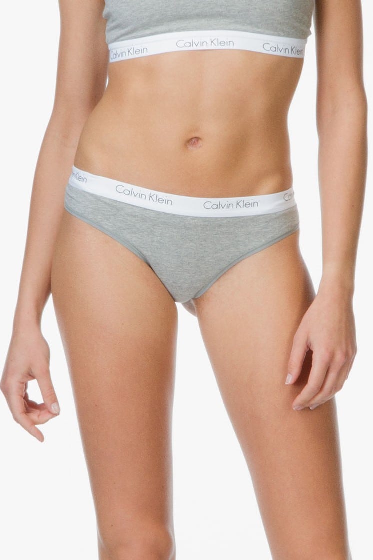 Calvin Klein šedá tanga s bílou gumou Thong Strings