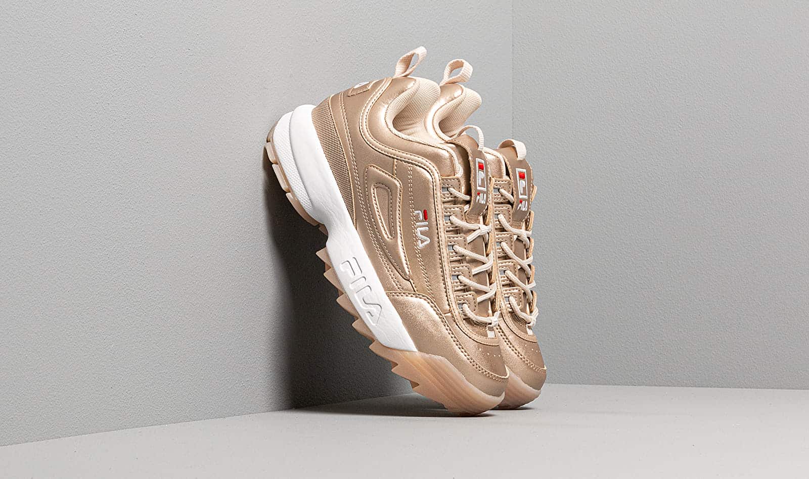 Fila Disruptor M low wmn Gold
