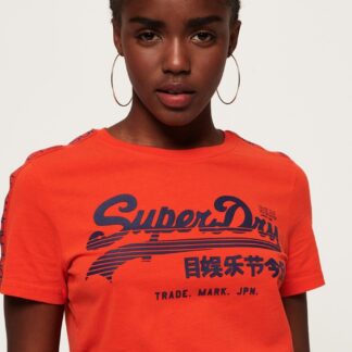 Oranžové dámské tričko s potiskem Superdry